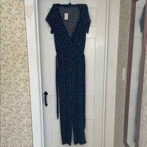 Elegant Black Polka Dot Jumpsuit with Pockets